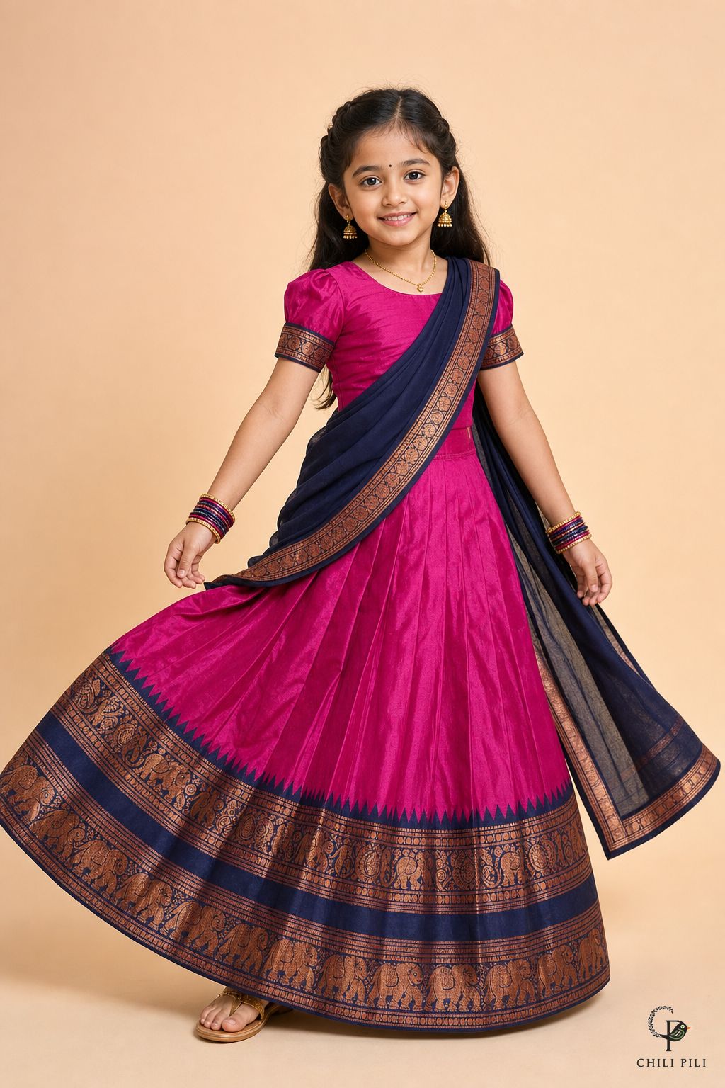 Girls Zari Elephant Pattu Pavadai Set Magenta - lifestyle movement shot
