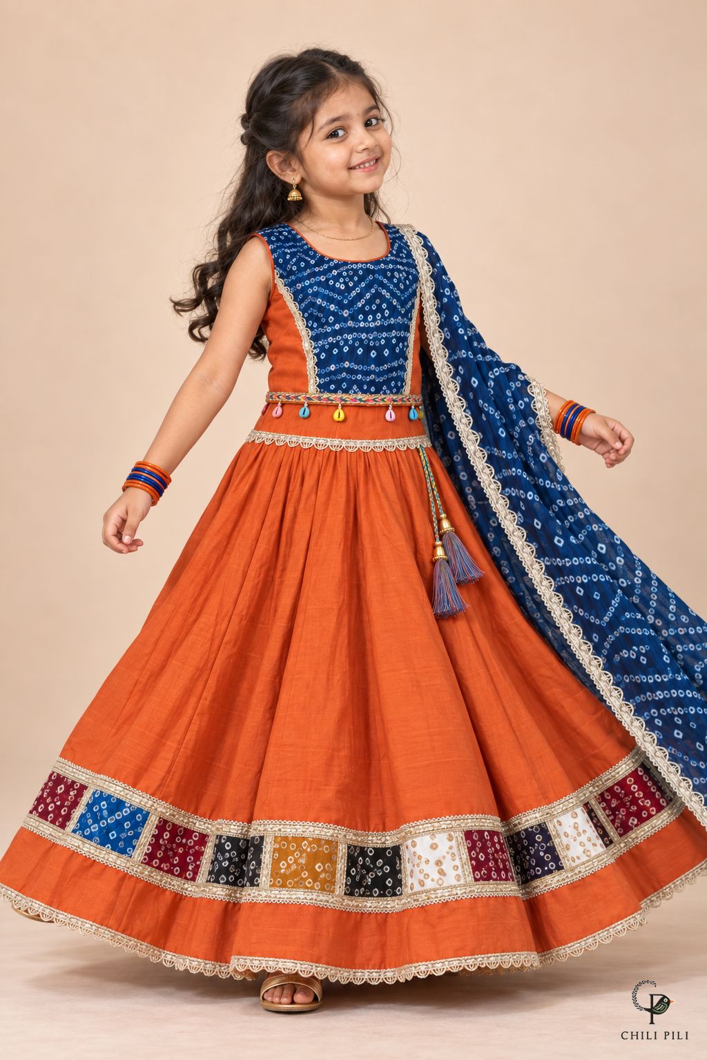 Girls Bandhani Patchwork Lehenga Choli Orange - lifestyle movement shot